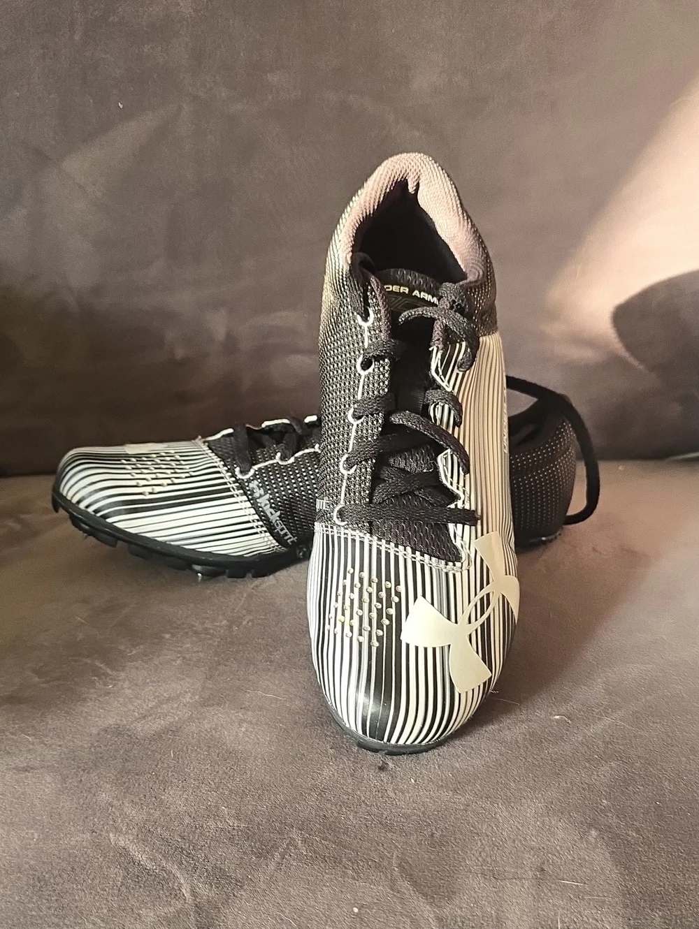 Under Armour Black & White Striped Athletic Cleats